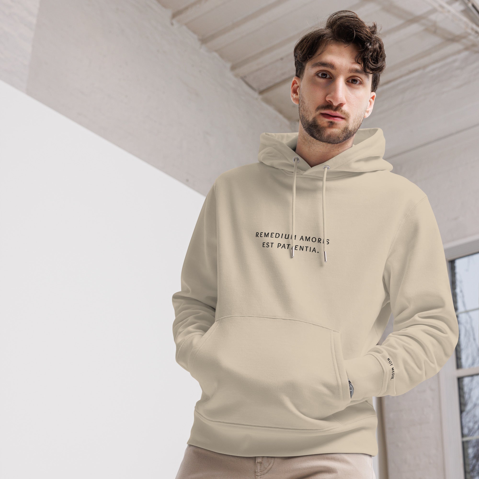 remedium amoris est patientia. Premium Hoodie - not medik.